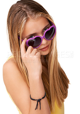 Buy stock photo Sunglasses, cool fashion or portrait of girl teenager in studio isolated on white background with blonde hair. Pride, casual child or confident model with swag, style or trendy heart shaped eyewear