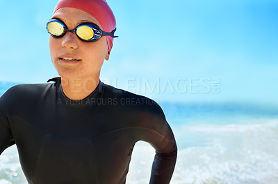 Buy stock photo Sports, goggles and woman swimming at the beach with blue sky for triathlon, race or competition training. Female Swimmer, athlete or person in ocean or sea for fitness workout or exercise for health
