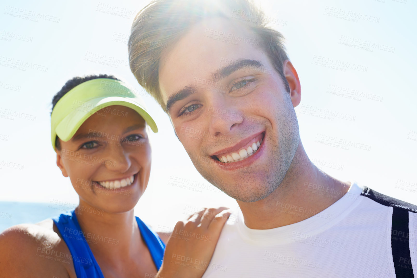Buy stock photo Couple, outdoor and portrait in beach, exercise and fitness with smile, training and sunrise for run. Man, woman and athletic for ocean, sea and workout together in summer, happy and touching
