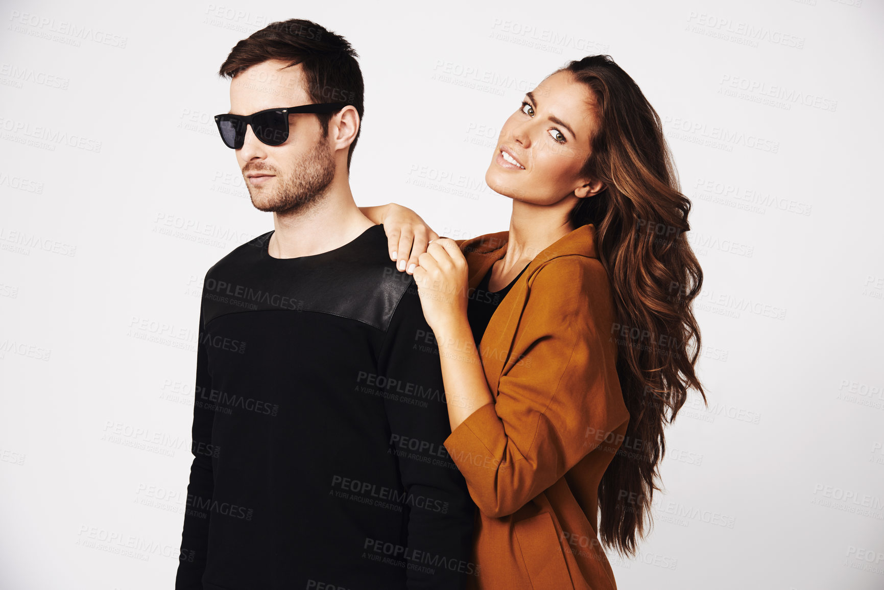 Buy stock photo Portrait of a beautiful young woman leaning against her boyfriend
