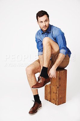 Buy stock photo Fashion, man and shoes in studio against white background for morning routine or dressing. Shoe, choice and casual male with outfit for style, decision and fashionable or trendy clothing aesthetic
