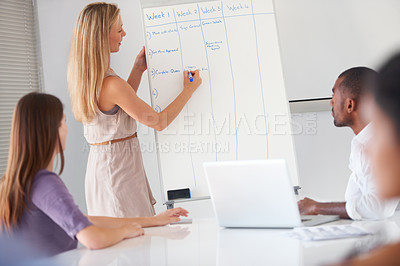 Buy stock photo Whiteboard presentation meeting, business people and leader writing agenda plan for project management. Morning briefing, boss and agency group attention, teamwork or planning schedule, list or tasks