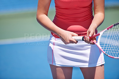 Buy stock photo Cropped shot of a young tennis player