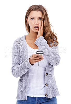 Buy stock photo Attractive young woman looking shocked at the camera