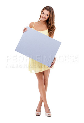 Buy stock photo Attractive young woman standing and holding a board
