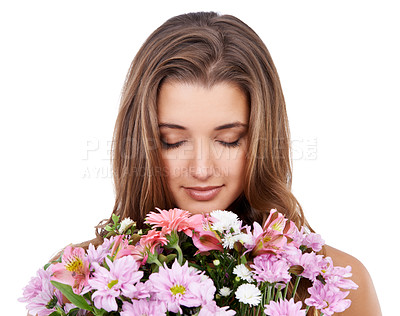 Buy stock photo Spring flowers, woman and smell for bouquet in studio, romantic and floral gift of valentines day. Young model, relax or eyes closed of scent on natural plants or birthday present by white background