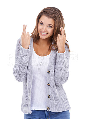 Buy stock photo Happy woman, portrait and hope with fingers crossed in studio for lucky news, feedback and waiting on white background. Model, hand sign and smile for wish, praying emoji or lottery results of winner