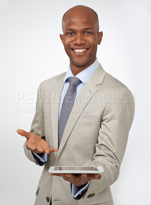Buy stock photo Portrait, business and black man with a tablet, presentation and employee isolated on white studio background. Face, African person or model with technology, promotion or digital app with opportunity