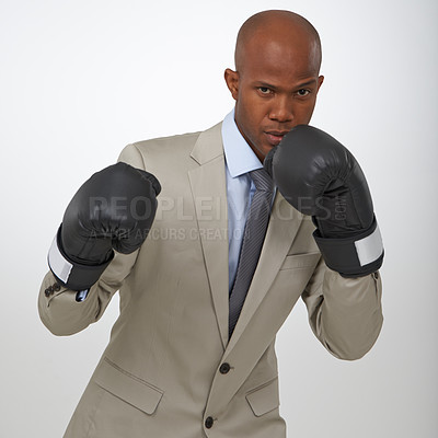 Buy stock photo Businessman, portrait and boxing gloves for competition or  corporate opportunity, rival or victory. Black man, face and confidence to fight for promotion in studio white background, career or mockup