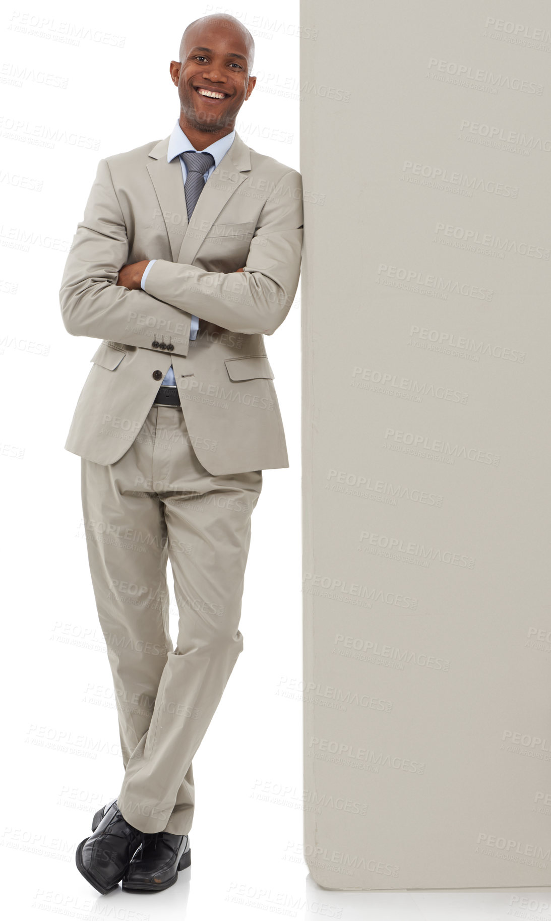 Buy stock photo Happy businessman, portrait or leaning on wall in confidence with arms crossed on a white studio background. Young black man or professional employee smile in business fashion or suit on mockup space