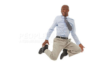 Buy stock photo An African-American businessman jumping in the air