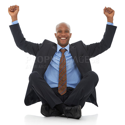 Buy stock photo Happy businessman, portrait and fist pump in celebration for bonus promotion on a white studio background. Excited black man or employee smile sitting on floor for winning, achievement or promo deal