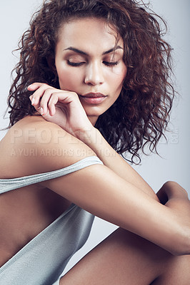 Buy stock photo Calm, beauty and woman with hair care in studio and confidence from skincare on gray background. Casual, hairstyle and model with eyes closed and natural makeup aesthetic or healthy glow on skin