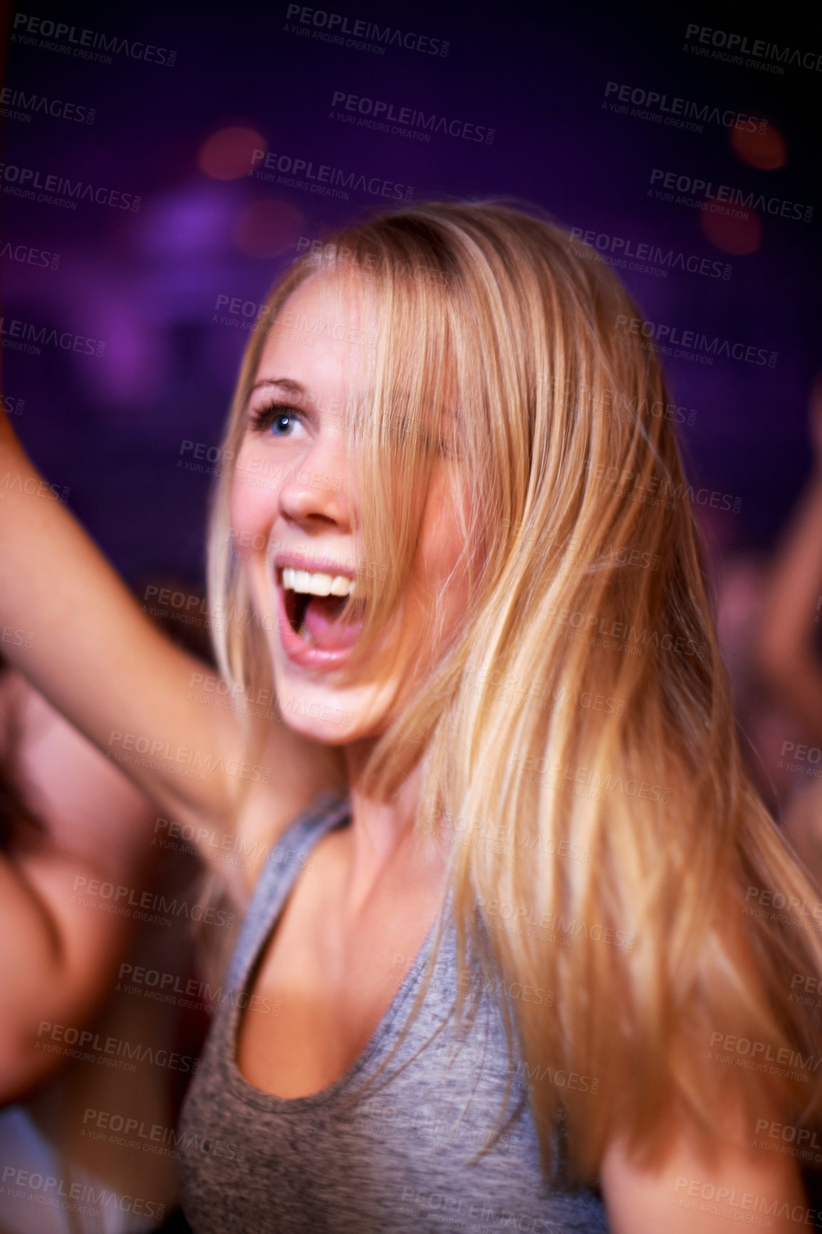 Buy stock photo Woman, dancing and music festival, happy and party in nightclub, celebrating and dj event. Disco, rock and freedom with girl dancer in crowd of fans for celebration, energy and techno performance