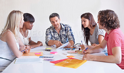 Buy stock photo A creative team working together in the boardroom on a project