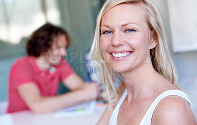 Buy stock photo Portrait, smile and business woman, creative professional or entrepreneur in company office. Face, happy designer or employee, confident blonde person and worker coworking at startup meeting on table