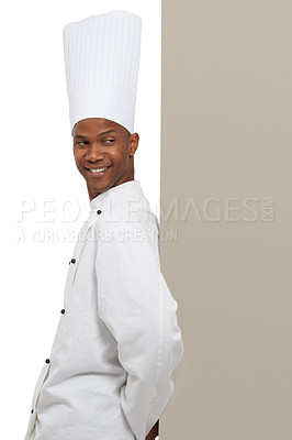 Buy stock photo Smile, man and chef on billboard menu in studio isolated on a white background mockup space. Happy, cooking and African person on poster for advertising, marketing and restaurant promotion banner