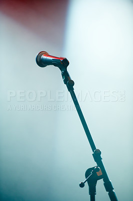 Buy stock photo Microphone stand, empty room and stage for karaoke in spotlight for audio performance with singing. Concert, technology and voice sound with electronics equipment and broadcast for jazz entertainment