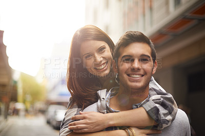 Buy stock photo Love, portrait and happy couple hug, piggyback and together for outdoor date, bonding and fun in new city. Wellness, happiness and face of gen z man, woman or people smile for relationship commitment
