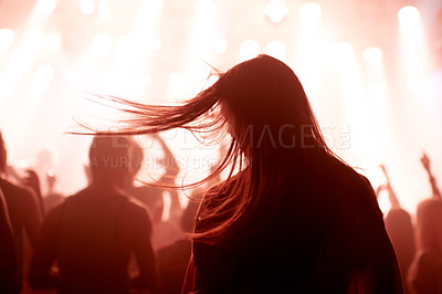 Buy stock photo Person, dancing and crowd or concert silhouette for live music performance or festival, rock or friends. Audience, club and red lights for celebration rave or band sound as partying, weekend or night