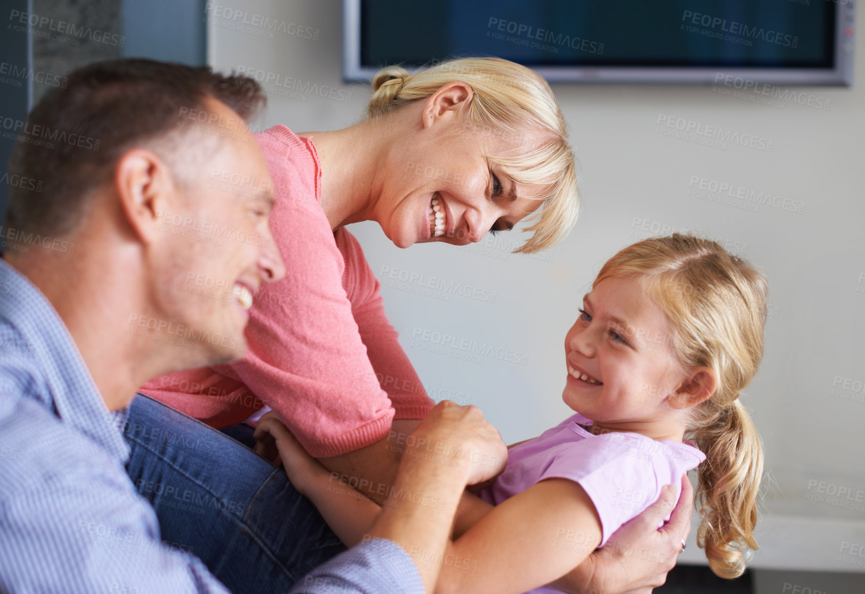 Buy stock photo Shot of a little girl and her father at home