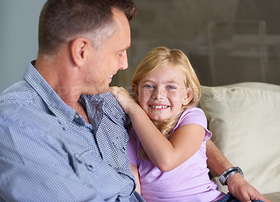 Buy stock photo Father, girl and hug in portrait, support and happiness or love in childhood by single parent at home. Daughter, daddy and together in embrace, trust and bonding or security and connection on couch