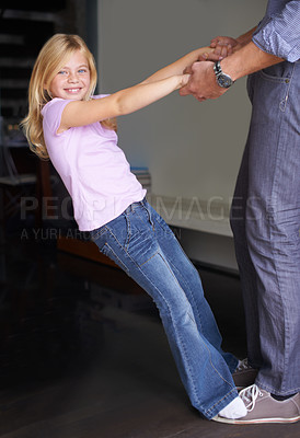Buy stock photo Portrait, kid dance with father and holding hands, family bonding and happy together in celebration at home. Child, dad and moving to music, learning and parent teaching girl for performance in house