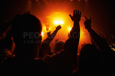 Buy stock photo Club, concert and audience with hands or lights for music, party and rave festival with silhouette and dancing. Disco, psychedelic event or performance with entertainment, crowd and rear view gesture
