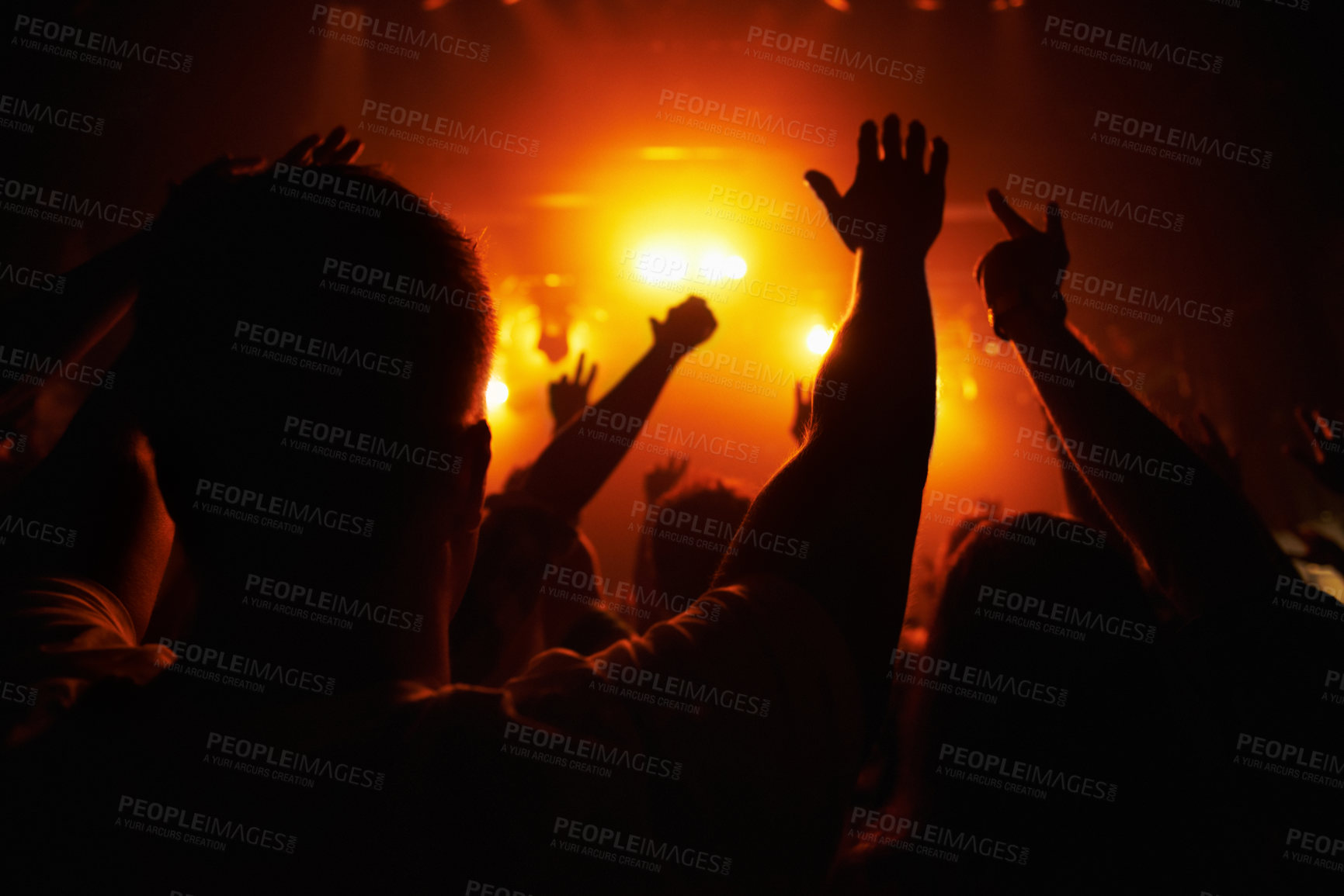 Buy stock photo Club, concert and audience with hands or lights for music, party and rave festival with silhouette and dancing. Disco, psychedelic event or performance with entertainment, crowd and rear view gesture