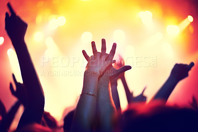 Buy stock photo Nightclub, concert and audience with hands or lights for music, party and rave festival with couple and love. Disco, psychedelic event and performance with entertainment, crowd and rear view gesture
