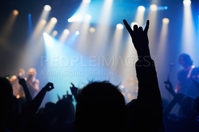 Buy stock photo Nightclub, festival and audience with rock or silhouette for music, band and concert with spotlight, dancing or show. Disco, live event and performance with entertainment, crowd and rear view gesture