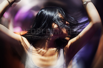 Buy stock photo Club, dance floor and woman with energy, music and freedom, blur and celebration fun. Party, concert and female person in a crowd with movement, motion and good vibes at festival, event or nightclub