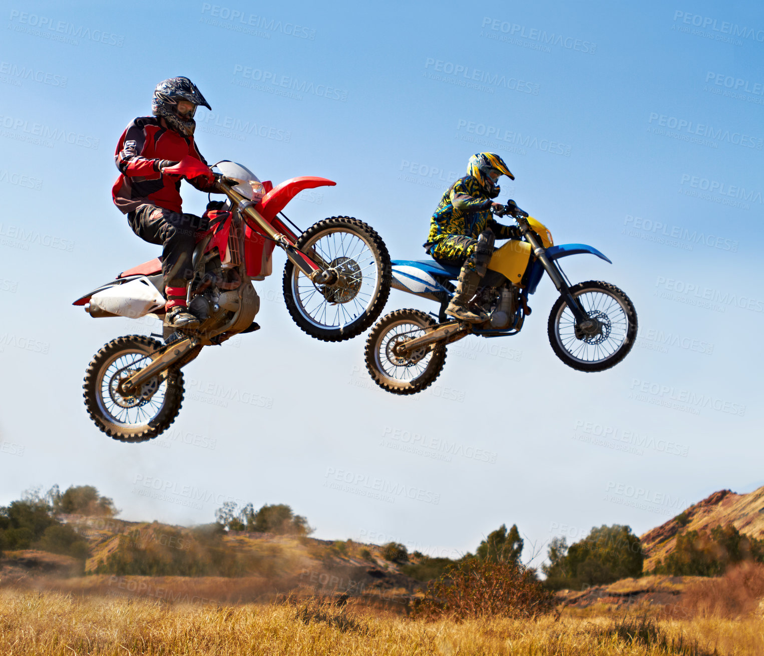 Buy stock photo Shot of dirtbike racers