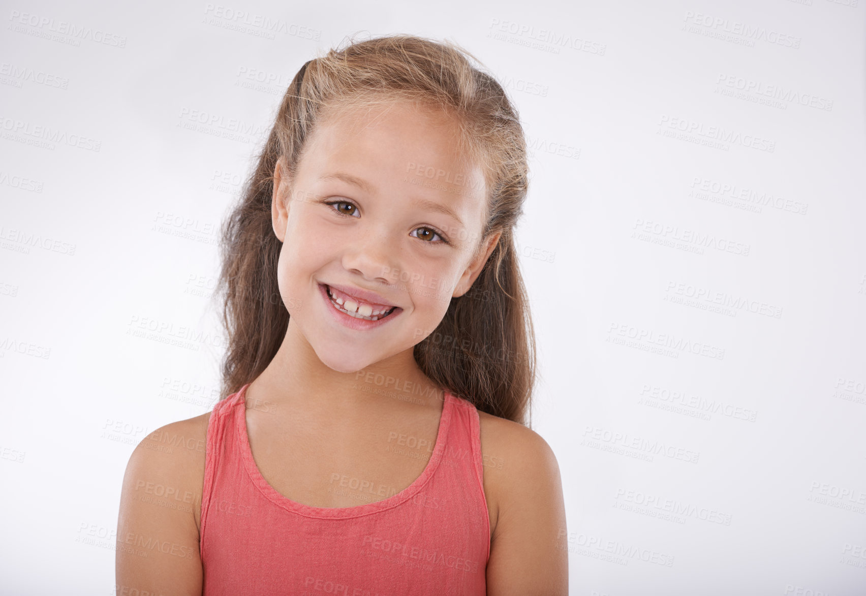 Buy stock photo Child, girl and portrait or smile in studio with confidence, positive attitude and carefree youth. Kid, face and happiness with calm expression, mock up space and casual outfit on white background