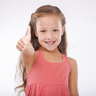 Buy stock photo Thumbs up, kid and portrait of girl in studio for winner, achievement or celebrate success on white background. Happy child, emoji or like sign for yes, feedback or thank you for agreement of support