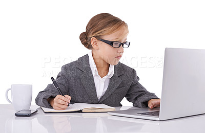 Buy stock photo Professional, child and notes from laptop research in studio, ideas and planning for agenda. Female person, pretend employee and writing in journal, business proposal and laptop on white background