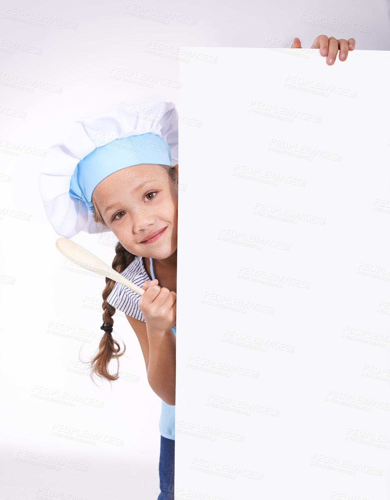 Buy stock photo Child, portrait and chef board space for cooking recipe information, ingredients or instructions. Girl, baker and white background or placard mockup for kitchen review or bakery cake, studio or spoon