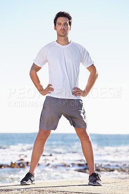 Buy stock photo Man, fitness and portrait on beach, runner outdoor for cardio and exercise, ocean and nature with athlete. Sports, running and endurance with training or workout for health and wellness with travel