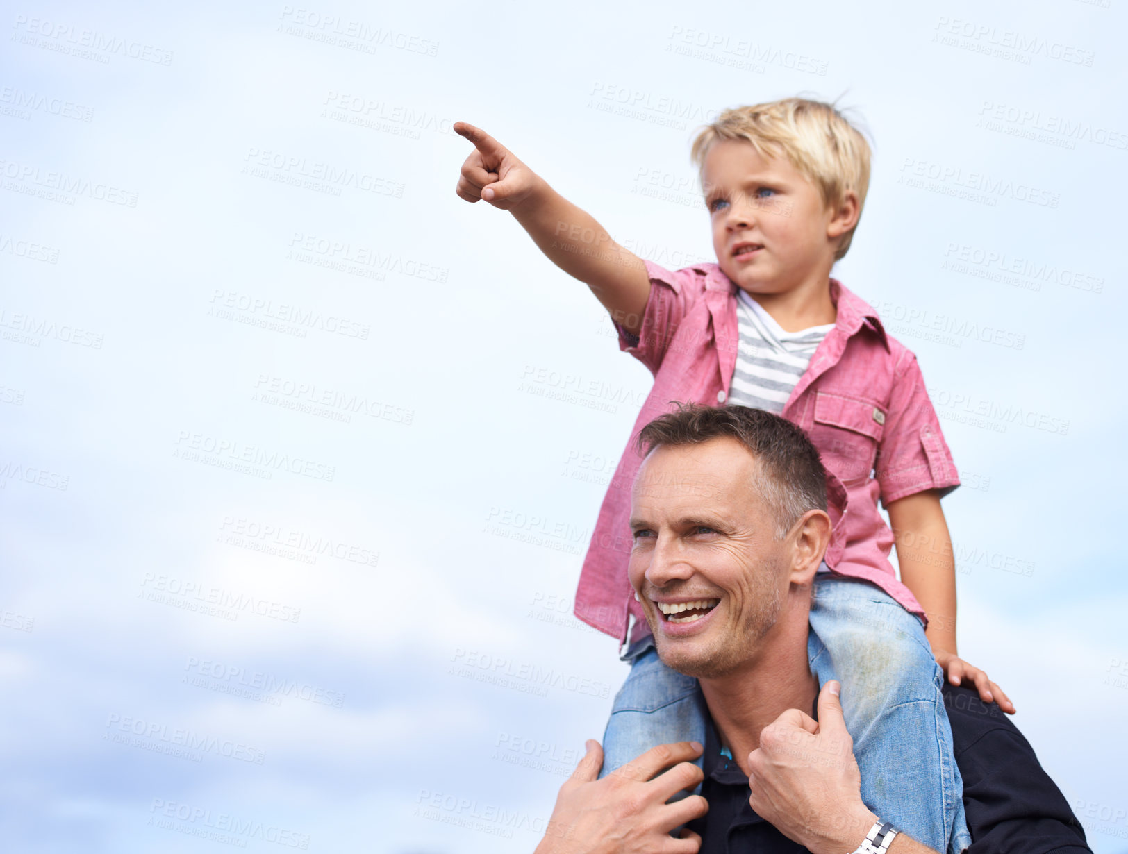 Buy stock photo Love, hand pointing and piggyback by father and son outdoor for fun, bonding or travel adventure. Happy family, support or parent with boy kid outside for shoulder ride, games or care on explore trip