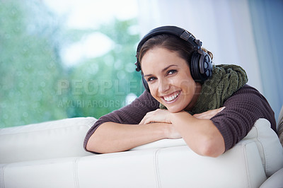 Buy stock photo Woman, portrait and music headphones on sofa at home for audio subscription, streaming multimedia and song in lounge. Happy lady, relax and listening to podcast, hearing sound and radio entertainment