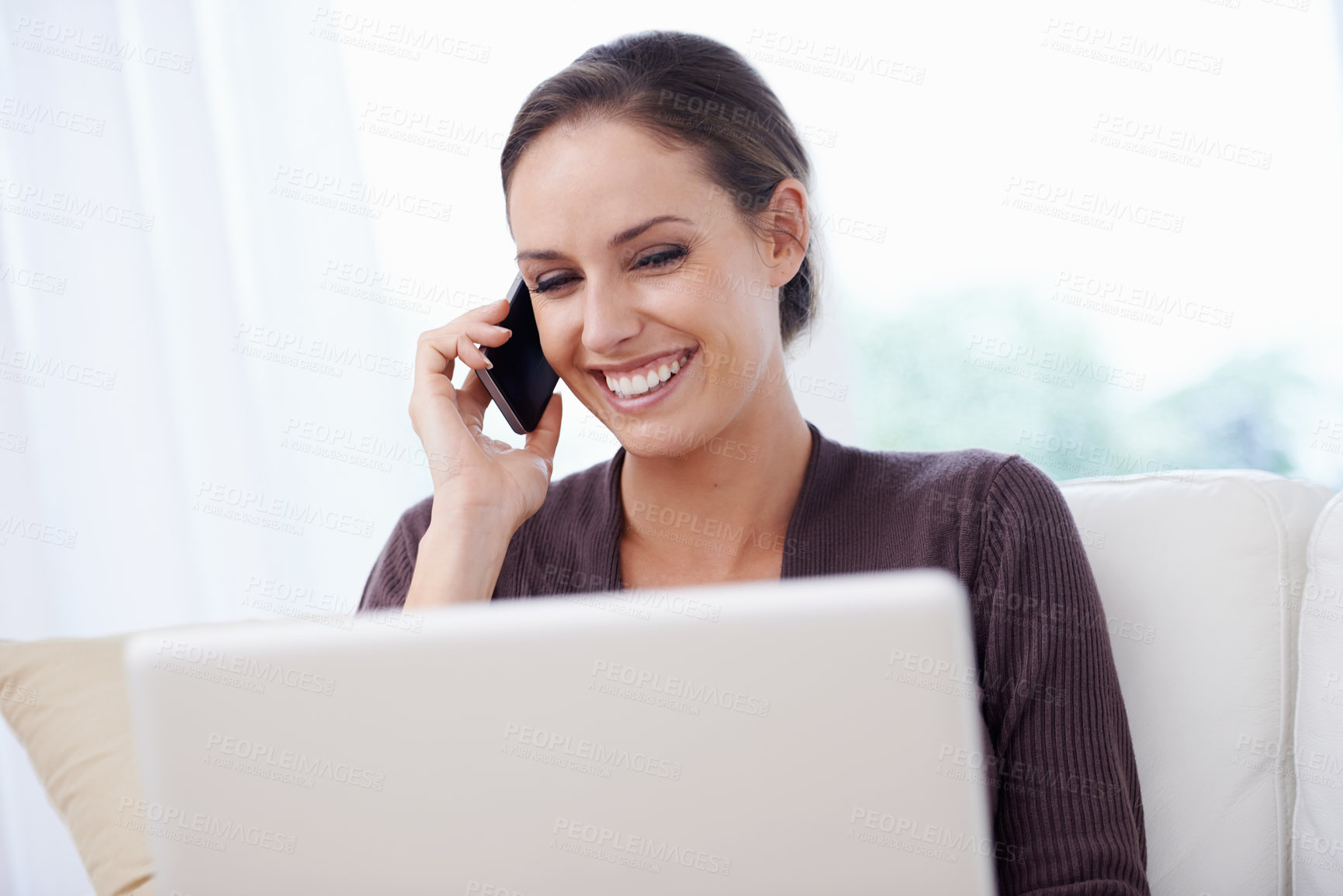 Buy stock photo Happy, woman and phone call with laptop on couch for remote work in communication or social media. Virtual, contact and person in home with networking on computer online and talking on smartphone