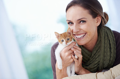Buy stock photo Happy, pet and portrait of woman with kitten in home for bonding, friendship and relax on sofa. Animal care, house and person with adorable, cute and young cat on couch for playing, embrace and love