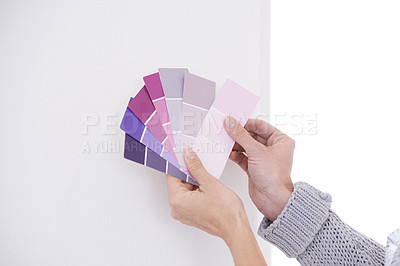 Buy stock photo Hands, color swatches for interior design and paint choice, home renovation and person for development and plan. DIY project, painter decision and palette for creativity and decor on wall background