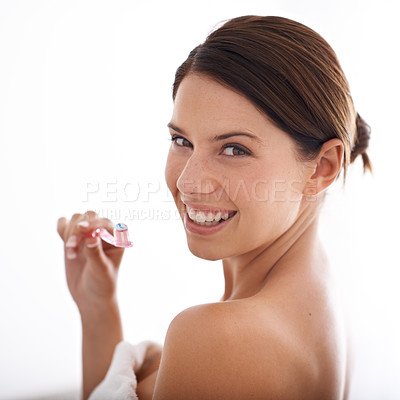 Buy stock photo Toothbrush, smile and portrait of woman on a white background for dental care, oral hygiene or cleaning. Healthcare, whitening and face of person brushing teeth with toothpaste for wellness in studio