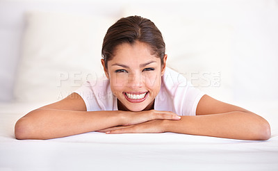 Buy stock photo Woman, wake up and relaxing in portrait on weekend, comfortable and lazy or resting in apartment. Female person, face and smiling in bedroom and calm or peace on holiday or vacation bed in Amsterdam