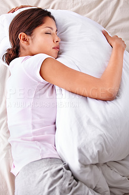 Buy stock photo Sleeping, duvet and woman relax in bedroom for comfort, cozy nap and rest with eyes closed in Puerto Rico home. Top view, fatigue and person sleep on cotton bedsheets with calm, peace and wellness