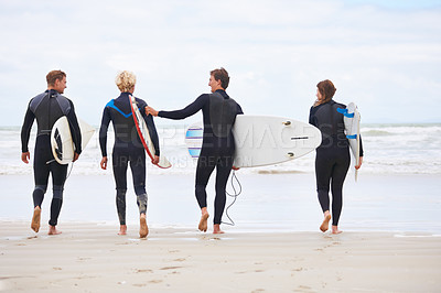 Buy stock photo Surfer friends, walking and back at beach with board, training and fitness on vacation in summer. Men, woman and group for wellness, health or workout by ocean, waves and freedom for holiday on sand