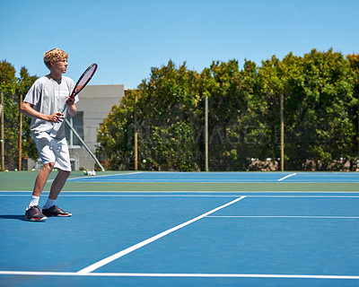 Buy stock photo Tennis, sports and teenager with energy, training and performance with competition or workout. Person, player or athlete with racket or court with wellness, activity or game with sunshine or hobby