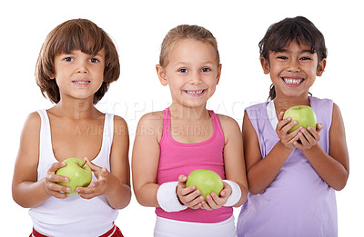 Buy stock photo Portrait, apple or happy kids with nutrition, wellness or healthy diet in studio isolated on white background. Food, children or face of a young friends with natural fruits for vitamin c with smile