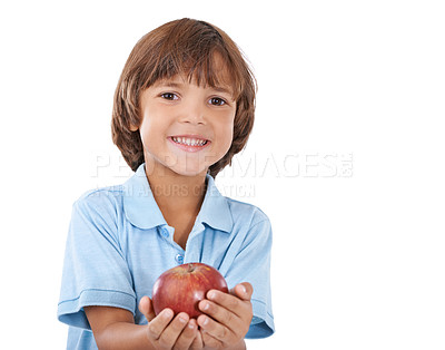Buy stock photo Portrait, apple or happy boy with nutrition, wellness or healthy diet in studio isolated on white background. Food, mockup space or face of a young kid holding natural fruits for vitamin c with smile